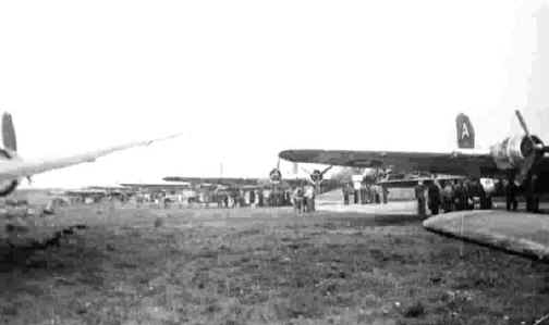 91st Bomb Group B-17's in line loading POWs at Stalag Luft I