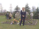 mary in front of memorial site