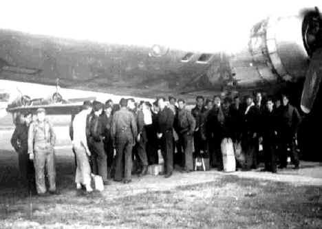 Close up loading of POWs at Barth, Germany - May 1945