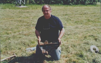 Phil Dufrasne w/ parts of Ted's Lancaster from WWII crash